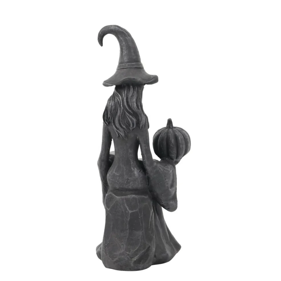 10.5" Distressed Black Witch with Book & Pumpkin Tabletop Décor by Ashland®