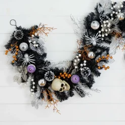 6ft. Artificial Halloween Black Garland with Skulls, Eyeballs & Spiders