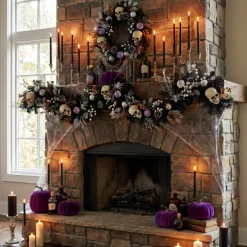 6ft. Artificial Halloween Black Garland with Skulls, Eyeballs & Spiders