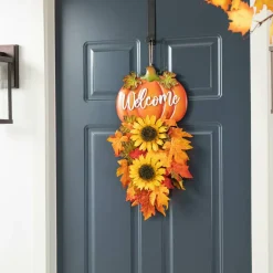 Glitzhome® 22.5" Fall Metal Pumpkin & Sunflower Wall Décor