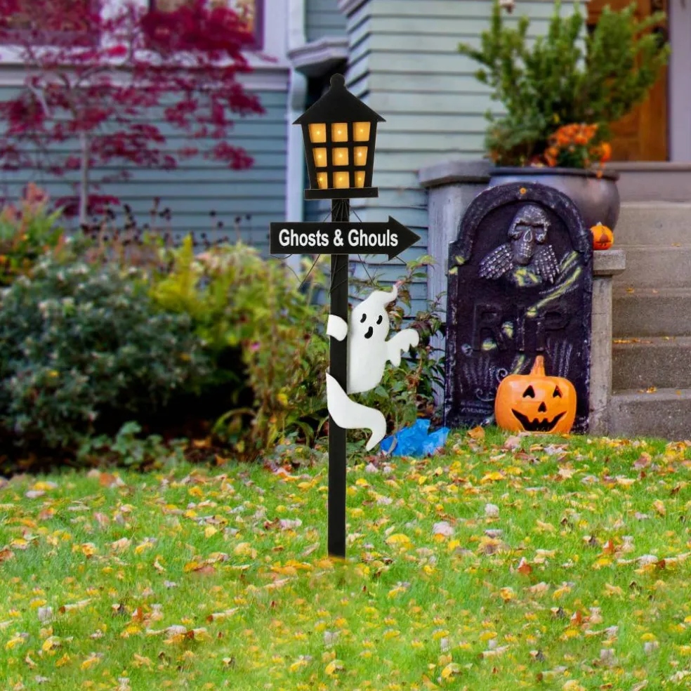 Glitzhome® 42" Lighted Halloween Haunted House Yard Stake with Timer