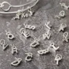 Mini Rhodium-Colored Alphabet Capitals Charm Set by Bead Landing™