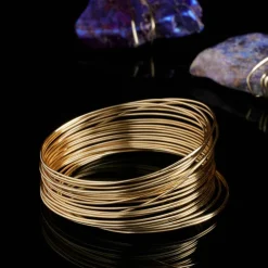 12 Pack: 24 Gauge Gold Beading Wire by Bead Landing™