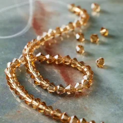 12 Pack: Preciosa® Czech Crystal Bicone Beads, 4mm by Bead Landing™