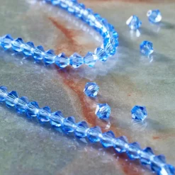 12 Pack: Preciosa® Czech Crystal Bicone Beads, 4mm by Bead Landing™