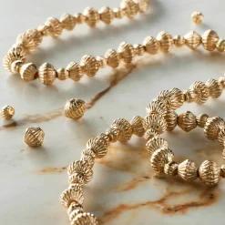 12 Packs: 96 ct. (1,176 total) Gold Mixed Metal Bead Value Pack by Bead Landing™