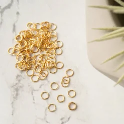 12 Packs: 100 ct. (1,200 total) Jump Rings by Bead Landing™