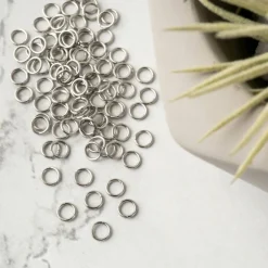 12 Packs: 100 ct. (1,200 total) Jump Rings by Bead Landing™