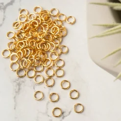 12 Packs: 100 ct. (1,200 total) Jump Rings by Bead Landing™