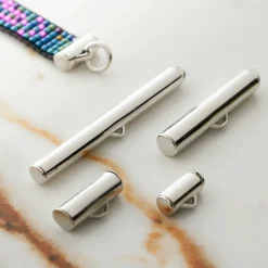 12 Packs: 16 ct. (192 total) Mixed Metal Slider End Tubes by Bead Landing™