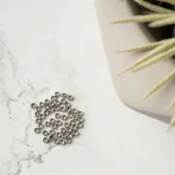 12 Packs: 50 ct. (600 total) 2mm Metal Crimp Beads by Bead Landing™