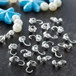 12 Packs: 150 ct. (1,800 total) 9mm Silver Clam Shell Crimp Bead Covers by Bead Landing™