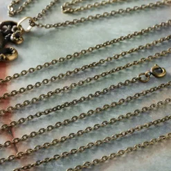 12 Packs: 3 ct. (36 total) 30" Oxidized Brass Flat Oval Chain Necklaces by Bead Landing™