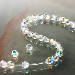12 Packs: 31 ct. (372 total) Preciosa Glass Crystal Round Beads, 4mm by Bead Landing™