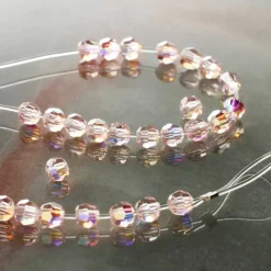 12 Packs: 31 ct. (372 total) Preciosa Glass Crystal Round Beads, 4mm by Bead Landing™