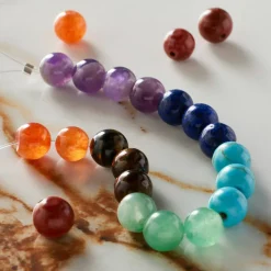 12 Packs: 22 ct. (264 total) Rainbow Mixed Stone Round Beads, 7.5mm by Bead Landing™