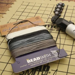 12 Packs: 4 ct. (48 total) The Beadsmith® S-Lon® 0.5mm Mixed Color Bead Cords