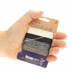 12 Packs: 4 ct. (48 total) The Beadsmith® S-Lon® 0.5mm Mixed Color Bead Cords