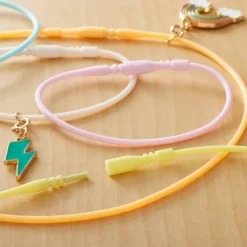 Pastel Mix Silicone Bracelets & Necklaces by Creatology™, 12ct.