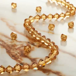 Preciosa Glass Crystal Bicone Beads, 6mm by Bead Landing™