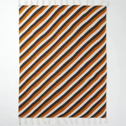 50" x 60" Black, White & Orange Striped Throw by Ashland®